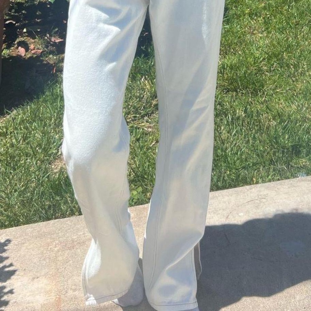 Beige Botany high waisted white jeans with slit at ankle. Size S.